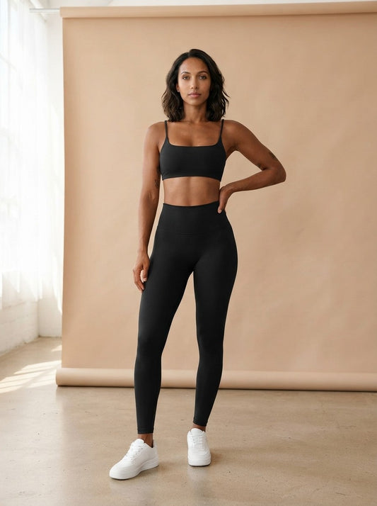 Model wearing the Cross Back Sports Bra, studio